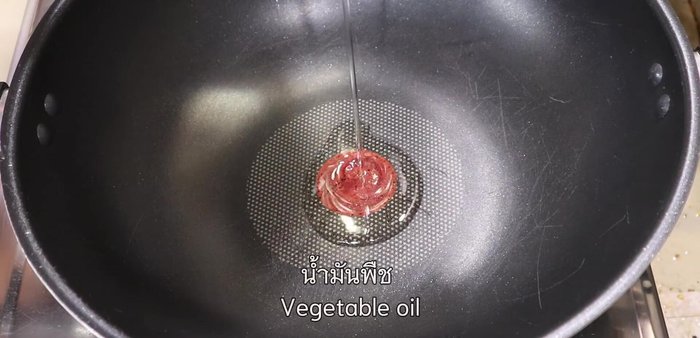 Continue to simmer, stirring occasionally. (Further details about the cooking process are required from the video)