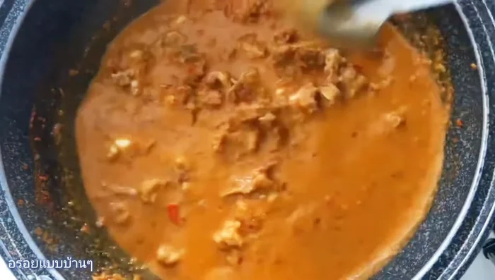 Simmer the curry until it thickens and comes to a boil (about 5-10 minutes).