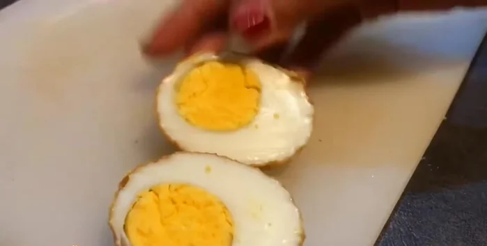 Arrange the egg halves on a plate.