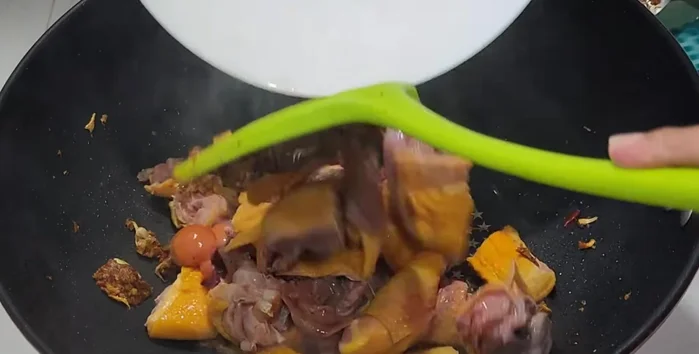 Add the chicken and stir-fry.