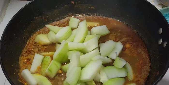 Add the pumpkin and continue to simmer until tender (about half an hour, using medium-low heat).