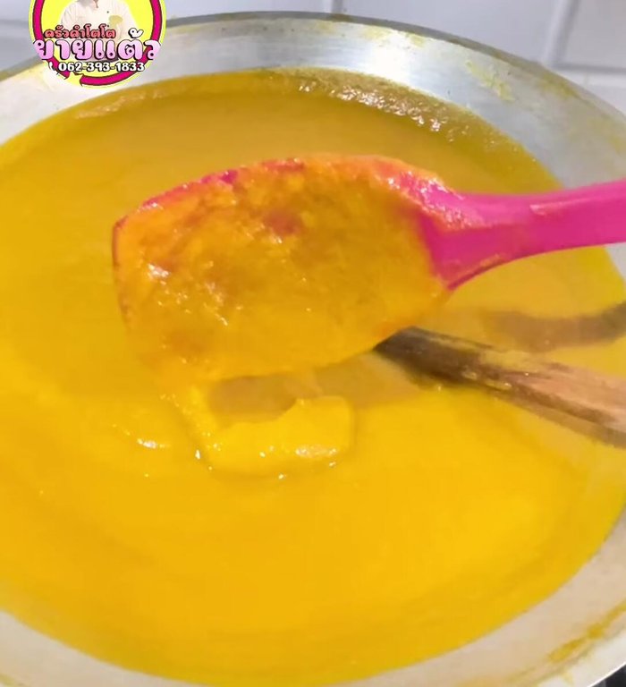 Continue to simmer for about 1 hour, or until the mango pulp reduces by half and sticks to the spatula.