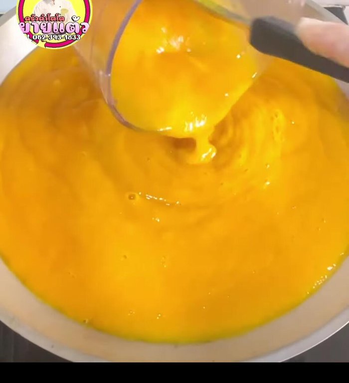 Pour the mango puree into a pot or pan. Use medium-low heat.