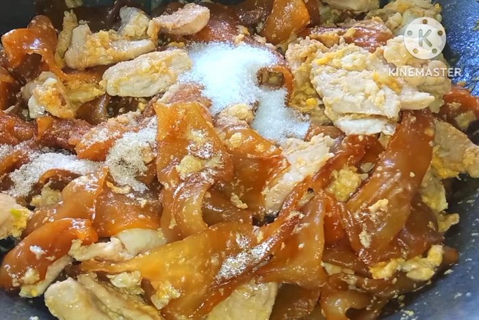 Season with sugar, seasoning powder, seasoning sauce, and oyster sauce. Stir-fry to combine.