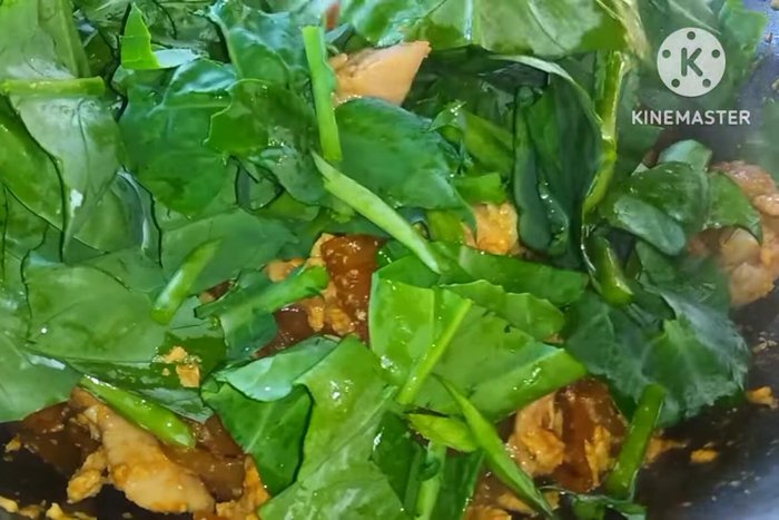 Add kale and stir-fry until cooked.