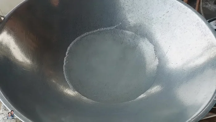 Boil or parboil the marinated pork in hot water until it changes color. Don't overcook.