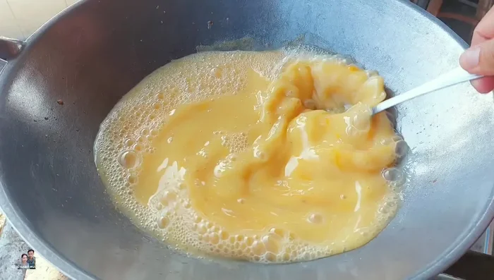Add the glass noodles (fresh or pre-soaked dried) to the egg mixture and mix well.