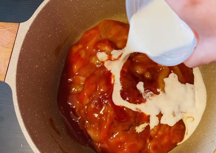 Add the cornflour mixture to the pot and mix well.