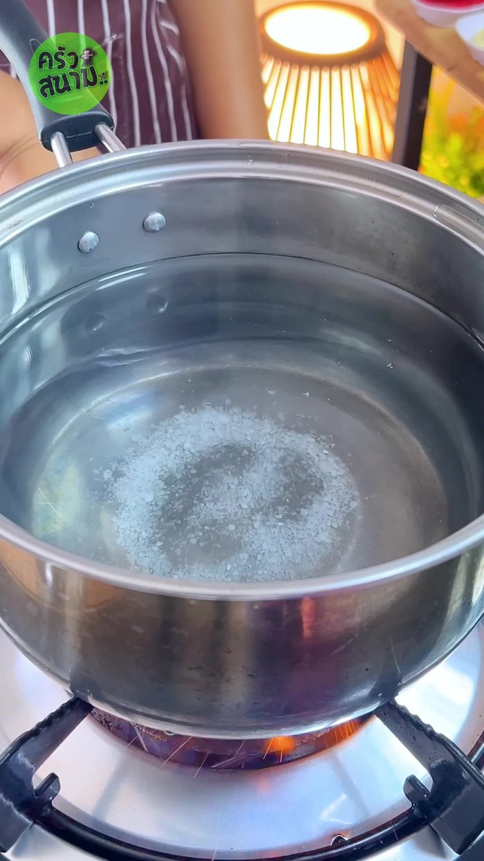 Boil eggs: Add water to cover the eggs, 1 teaspoon of salt. Use medium heat. Stir to create a whirlpool. Add 5 eggs and boil for 1 minute, then set timer for 7 minutes.