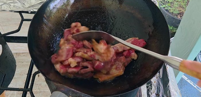 Every 5 minutes, gently flip the pork using a spatula to ensure even cooking.