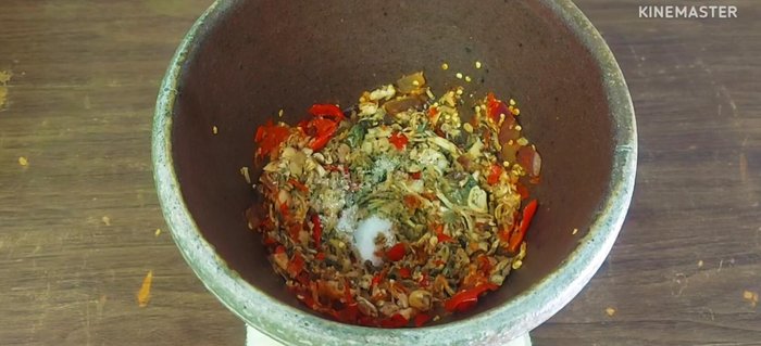 Season the mixture with fish sauce to taste. Adjust the consistency with water.