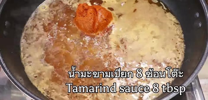 Add sea bass and simmer until cooked through.