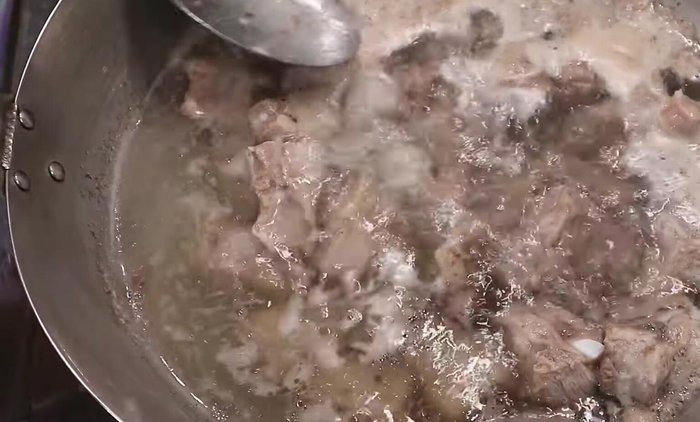 Heat oil in a wok or large frying pan over medium-high heat.