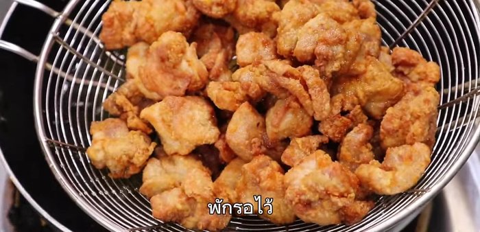 Heat oil in a frying pan. (This step is implied by the audio and is estimated)