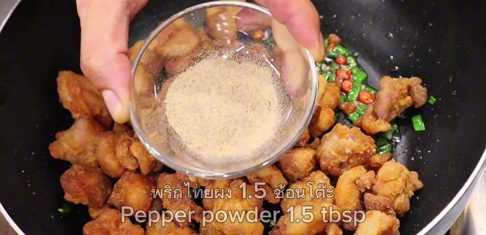 Fry the chicken until golden brown and crispy. (This step is implied by the audio and is estimated)