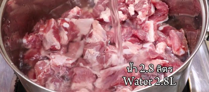 Add the pork bone and mushrooms to a pot and fill with water.