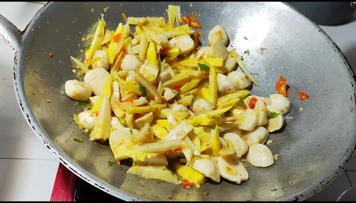 Season with seasoning sauce, light soy sauce, oyster sauce, and sugar. Stir-fry until cooked.