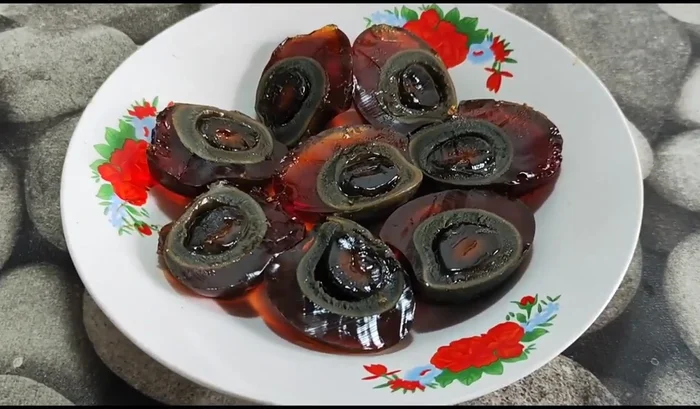 Crack the century eggs neatly and fry them until golden brown.
