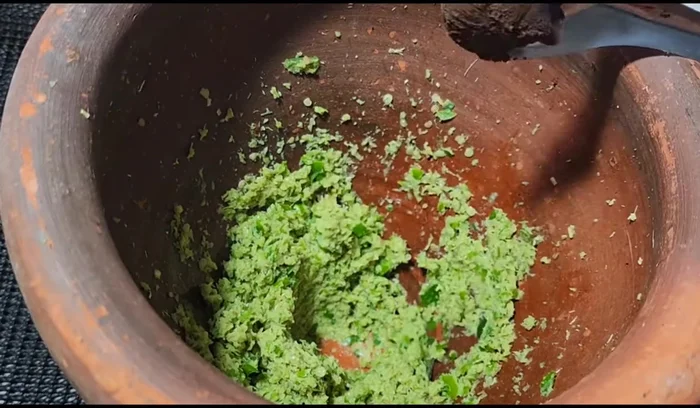 Add vegetarian shrimp paste (or soybean paste) and pound until well mixed.