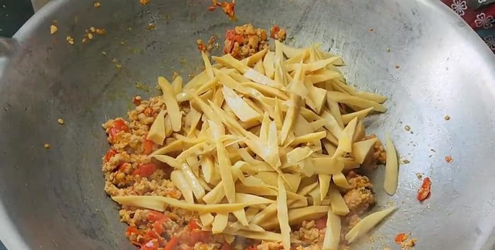 Add the bamboo shoots and stir-fry.