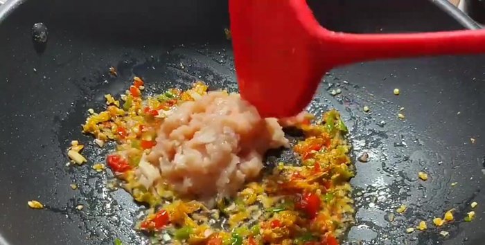 Add the minced chicken and stir-fry until cooked.