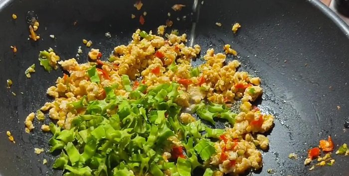 Add the winged beans and a little water.