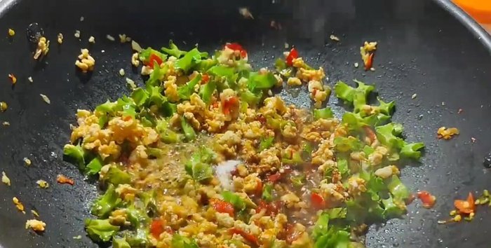 Add a little sugar and continue to stir-fry until the ingredients are combined.