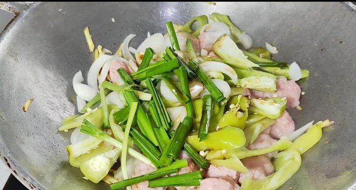 Season with soy sauce, oyster sauce, and sugar.