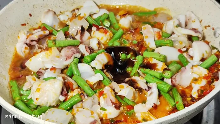 Season with oyster sauce, seasoning sauce, sugar, and optional MSG.