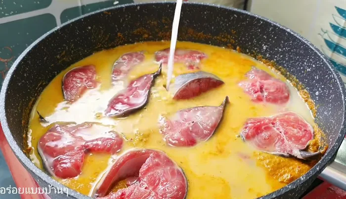 Add more coconut milk or water as needed. Increase the heat to medium or high.