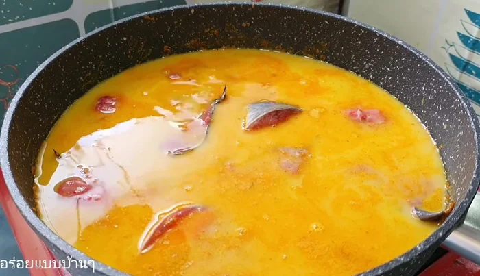 Wait until the fish is cooked through.