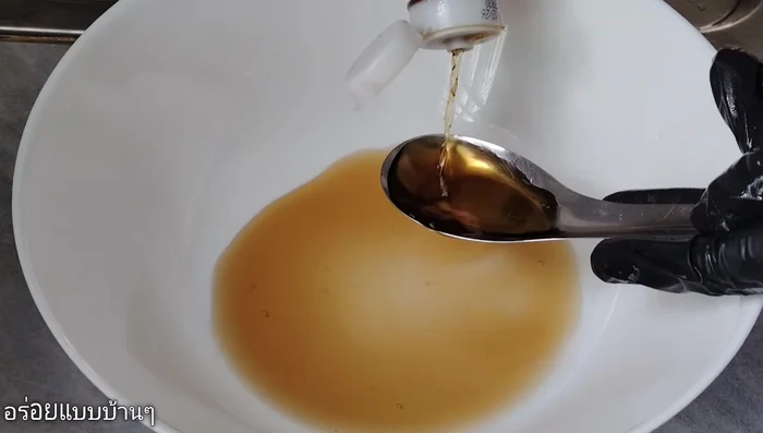 Prepare the marinade: In a container, combine fish sauce, light soy sauce, pepper, chili, and white sugar. Mix until the salt and sugar dissolve.