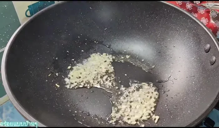 Add the egg and scramble until cooked.
