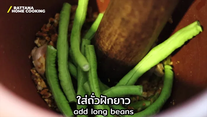 Garnish with roasted peanuts.