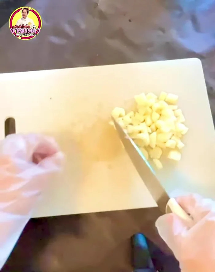 Add 5 large chopped onions and 3 tablespoons of roasted peanuts.