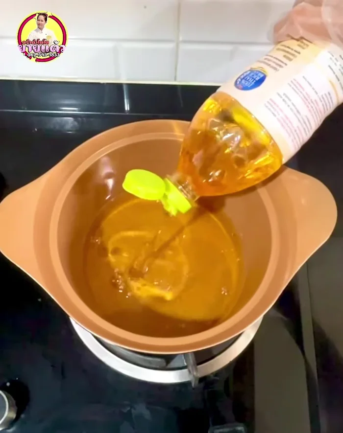 Heat oil in a pot or pan. Roll the dough into bite-sized pieces.