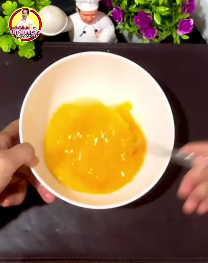 Crack the eggs into a bowl and whisk until foamy. No additional seasoning is needed as the fish sauce is already salty. (23.92)