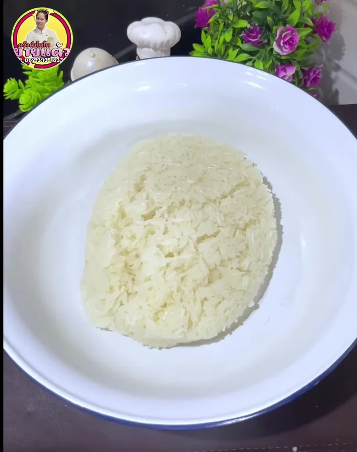 Once sticky rice is cooked, add coconut milk gradually to the rice, mixing gently to avoid over-soaking. Let it sit for half an hour to absorb the coconut milk.