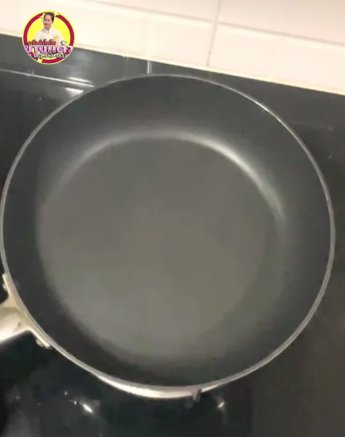 Heat a pan to medium heat. Pour a ladleful of batter onto the hot pan.