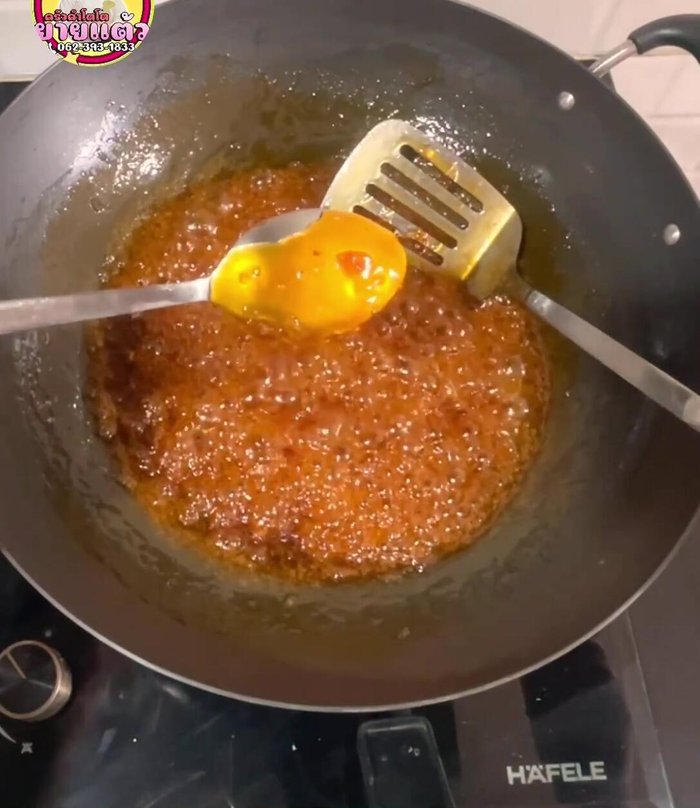 Add food coloring (7 drops orange, 2 drops bright red). Mix well.