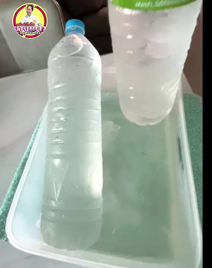 Place the frozen ice bottles in front of the fan to cool the air. For optimal cooling, position the bottles directly in front of the fan.