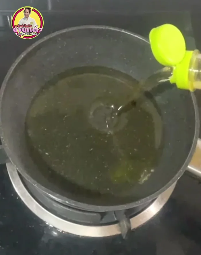 Heat a pan with oil over medium heat. Stir the batter before pouring to prevent flour from settling at the bottom. Pour the batter into the pan, spreading it evenly. Reduce heat to medium-low and fry until crispy.