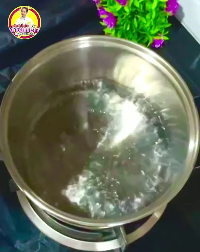Add the ground chili mixture to the boiling water.