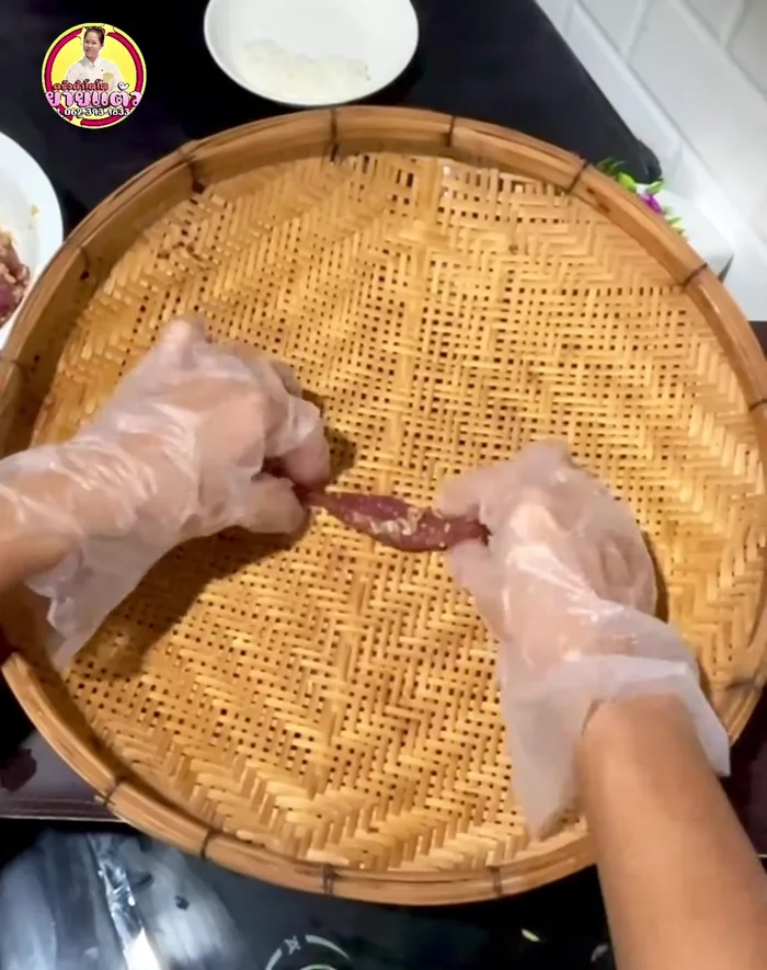 Arrange the marinated pork in a winnowing basket and sun-dry for 2-3 hours, or until dried (depending on the sun’s intensity).