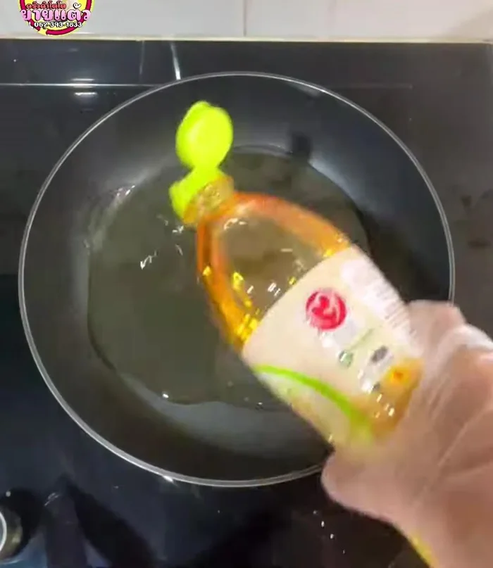 Heat vegetable oil in a frying pan over medium-low heat. Don't add too much oil; about half full is sufficient.