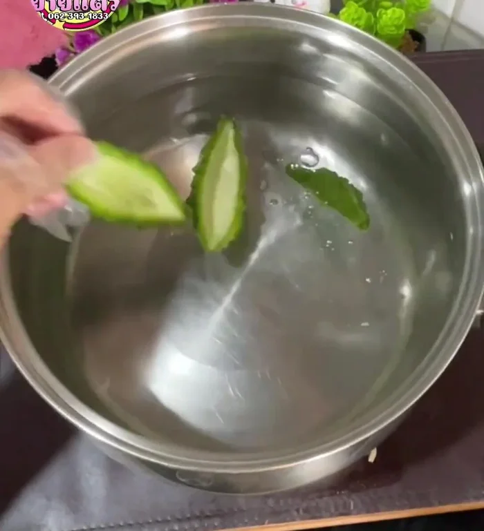 Soak the prepared bitter melon in the completely cooled salt water for about 5 hours. This helps reduce bitterness.