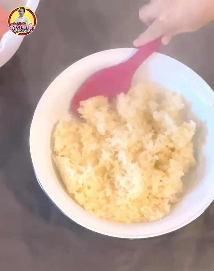 Combine rice and watermelon juice: Mix the steamed sticky rice with the watermelon juice until well combined but not mushy.