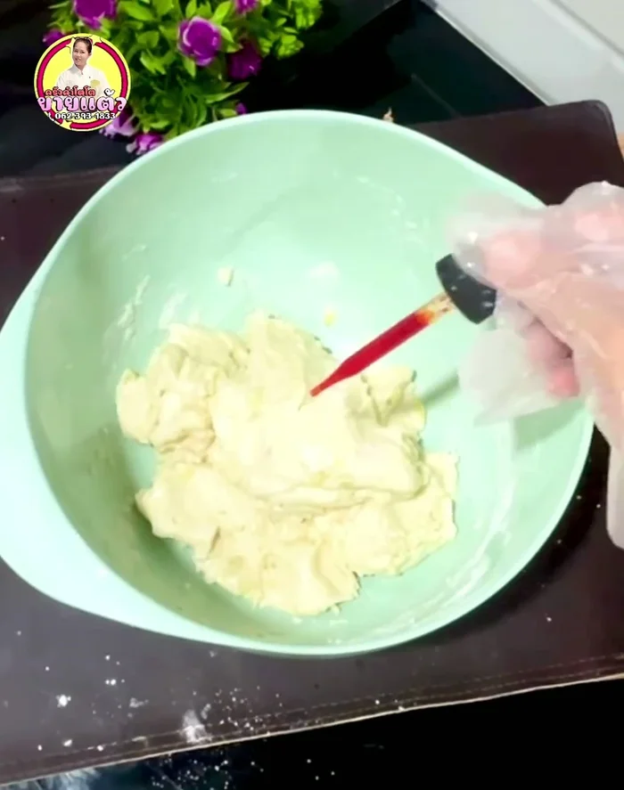 Add food coloring (orange and egg yolk) and knead the dough for about 5 minutes until the color is even.