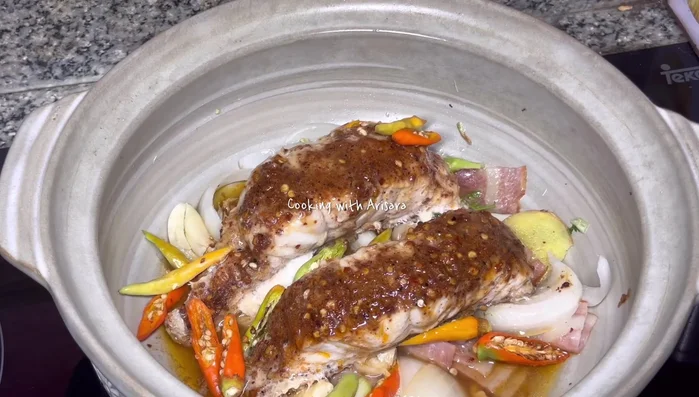 Season the grouper fillet with the mala mixture.