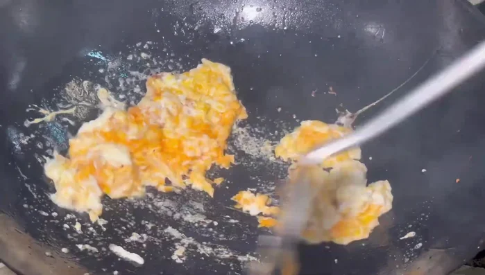 Remove the cooked eggs and set aside.